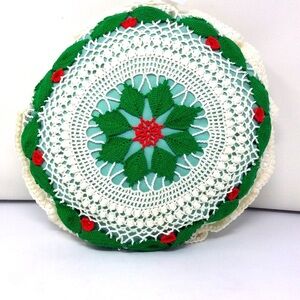 Vintage Christmas crocheted holly pillow.